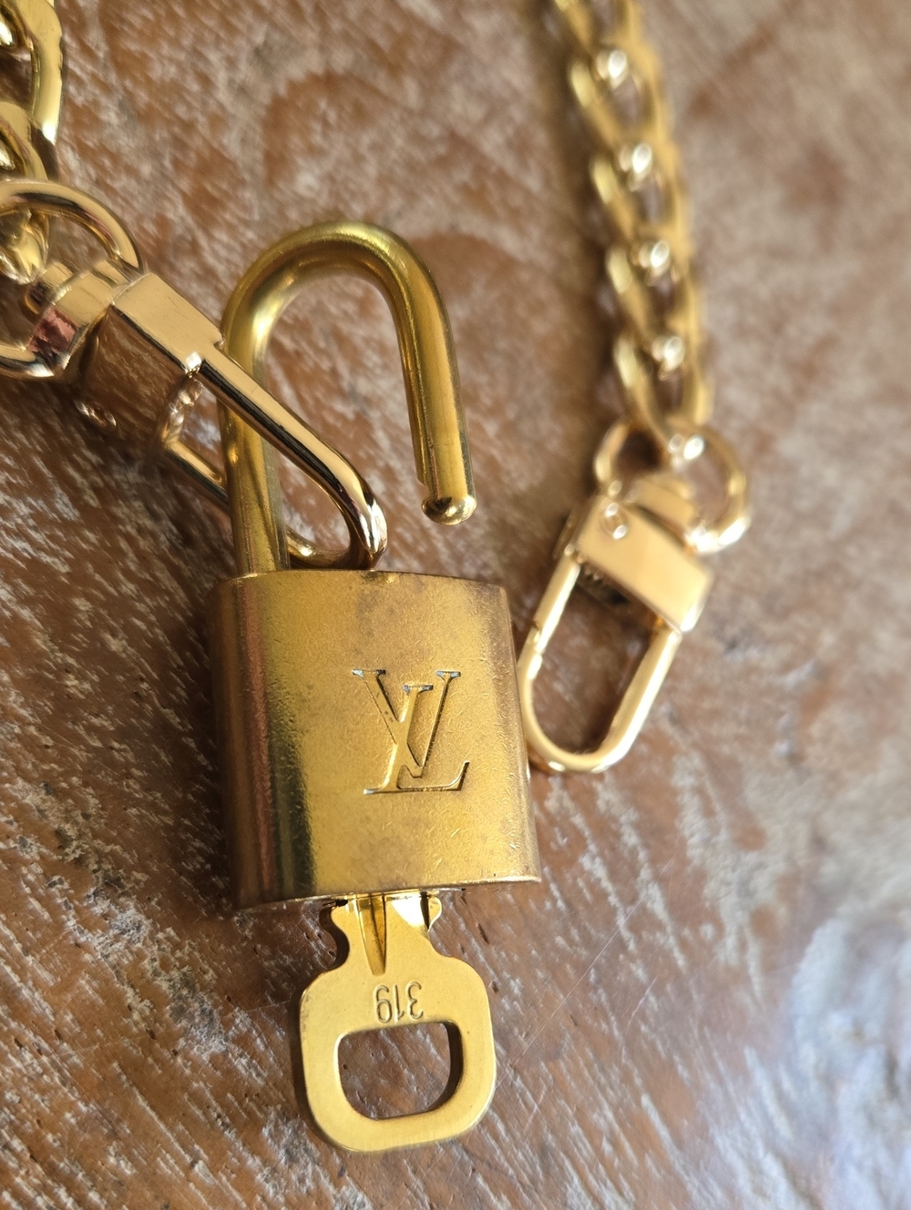 Authentic Louis Vuitton Lock & Key #319 on 18" Gold Tone Chain.  (BIN 011)
